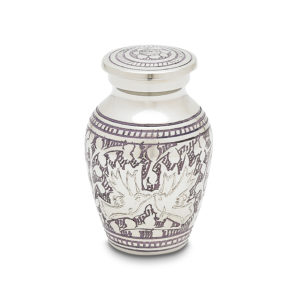 Decorative white ceramic urn with purple mythological motifs.