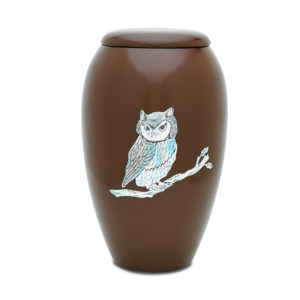 Brown vase with white owl illustration.