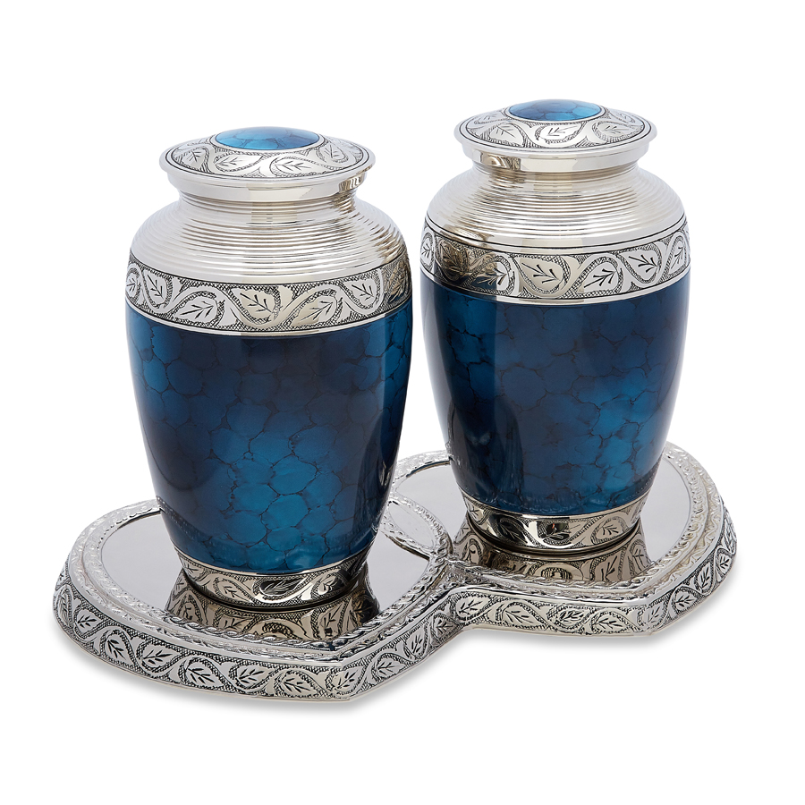 Blue and silver decorative urns on tray.