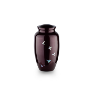 Dark vase with white bird designs on white background
