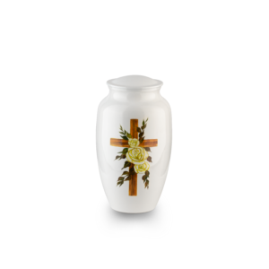 Decorative funeral urn with floral cross design.