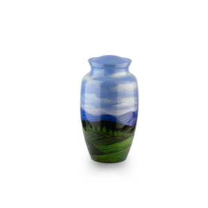 Decorative landscape-painted vase on white background.