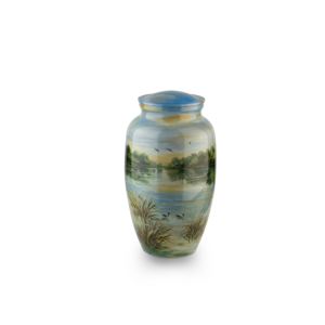 Hand-painted urn with serene landscape design.