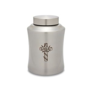 Stainless steel urn with engraved cross design.