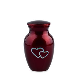 Burgundy urn with double heart design.