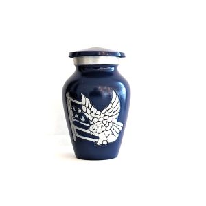 Blue vase with white eagle design.